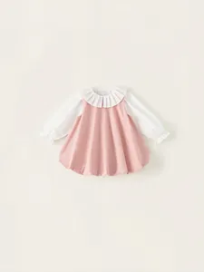 Rosa Mädchenkleid mit Rüschenkragen und Puffärmeln im Lagenlook für den Frühling