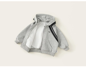 Detail view of boys' grey hooded sweatshirt with zip-up front and ribbed cuffs
