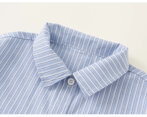 Close-up of a blue and white striped shirt collar with detailed stitching and white button