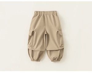Rear view detail of kids khaki cargo joggers showing elastic waistband and fabric texture