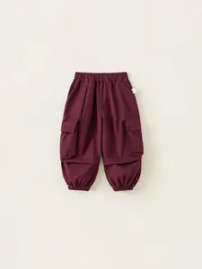 Kids minimalist dark red cargo joggers with elastic waist and side flap pockets