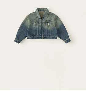 Close-up of vintage wash denim jacket featuring unique gradient embroidery and pockets