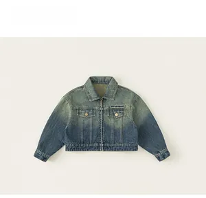 Detail of children's gradient denim jacket featuring yellow-blue wash and chest pockets