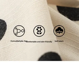 Detailed macro view of soft polka dot fabric texture with formaldehyde-free quality