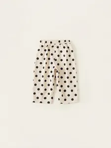 Kids minimalist beige wide-leg cotton pants with black polka dots and elastic waist