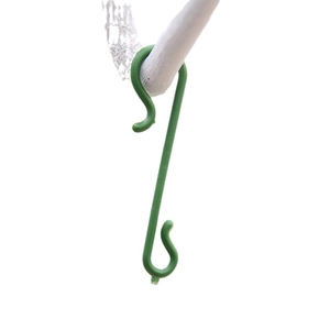 Green S-shaped plastic Christmas ornament hooks for hanging holiday tree decorations