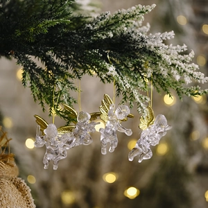 Set of 4 transparent Christmas angel ornaments with gold wings on green pine branches