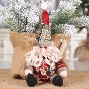 Cute Santa Claus plush ornament with plaid fabric and button details for Xmas decor