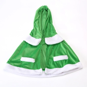 Flat lay of a green velvet Christmas hooded cape with white faux fur trim for kid costumes