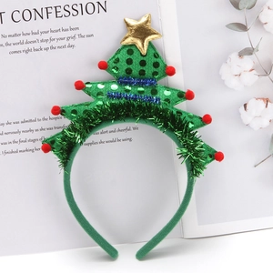 Christmas tree headband with green tinsel, red pompoms and gold star for holiday parties