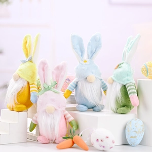 Set of four plush Easter Gnomes with long rabbit ears in macaron pastel colors
