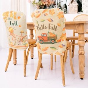Fall harvest themed dining chair covers with pumpkins and red truck on faux linen fabric