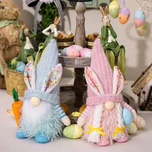 Easter Gnomes plush set with bunny ears holding a carrot and colorful egg ornament