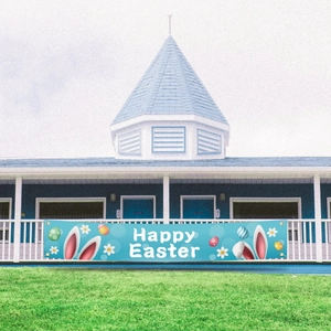 Outdoor Happy Easter banner with bunny ears and colorful eggs on blue background