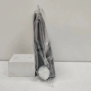 Gray Christmas chair cover with white pom-pom detail in a clear plastic snap bag