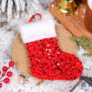 Sparkling red sequin Christmas stocking with white faux fur cuff and hanging loop