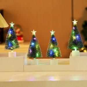 Mini LED glowing Christmas trees set with stars and white bases for desk decoration