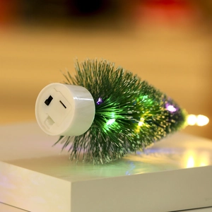 LED colorful glowing pine needle Christmas tree with snow decor on white base
