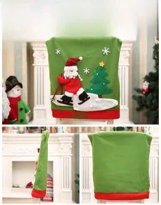 Dettaglio coprisedia natalizio verde con Babbo Natale che scia e decorazioni ricamate