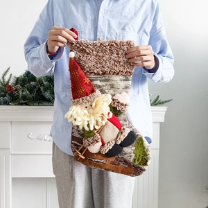 Large handmade Christmas stocking featuring a 3D Santa Claus figure on birch bark texture