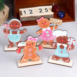 Set of 4 Christmas wooden gingerbread man table ornaments with festive base decorations