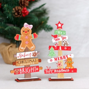 Festive wooden Christmas tabletop decorations featuring gingerbread man and tree designs