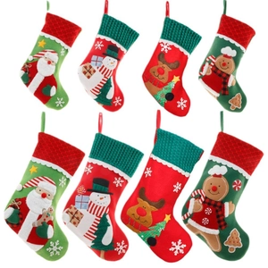 Set of 8 festive Christmas stockings featuring Santa, Snowman, and Gingerbread Man designs
