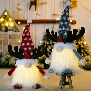Lighted Christmas gnomes with reindeer antlers and warm LED glow for festive decor