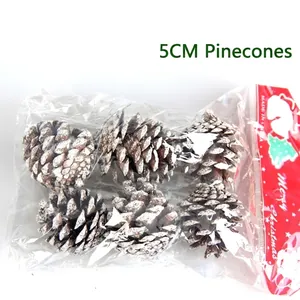 Set of 6 natural 5cm Christmas pine cones with artificial snow in retail packaging