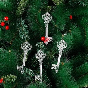 Lot de 4 ornements de Noël clés transparentes sur sapin avec des baies rouges