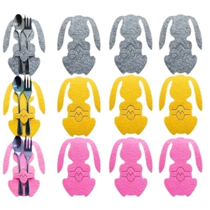 Detail of 12-piece felt bunny cutlery holders in grey yellow and pink for Easter table decor