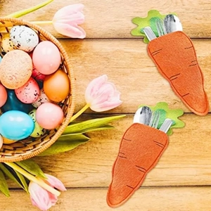 Easter carrot felt cutlery holder set with stainless steel utensils on wooden table
