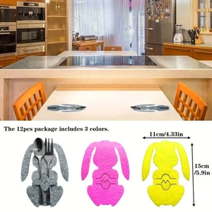 Detail of bunny-shaped felt cutlery holders in grey, pink and yellow for Easter decor