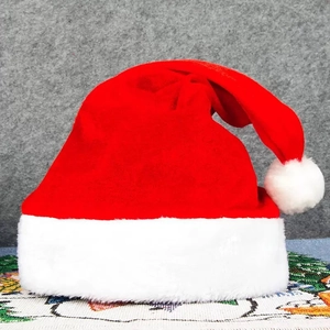 Classic red plush Santa hat with fluffy white faux fur trim for adults and children