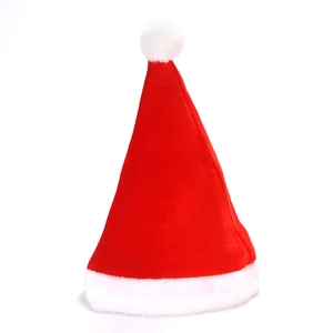 Detailed close-up of thick red velvet fabric and white faux fur trim on a Christmas hat