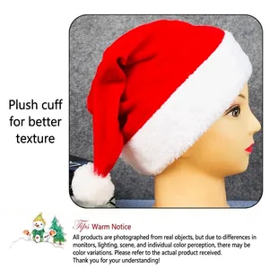 Classic red plush Santa Claus hat with white faux fur trim and pom-pom for Christmas