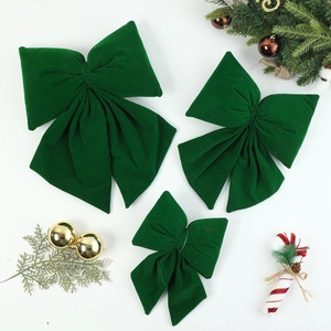 Ensemble de trois nœuds de Noël en velours vert foncé de tailles variées pour décoration