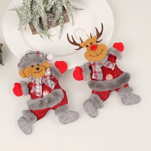 Christmas tree hanging ornaments featuring plush bear and reindeer with knitted scarf