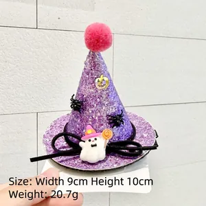 Detail of mini purple glitter witch hat headband with pumpkin and ghost decorations