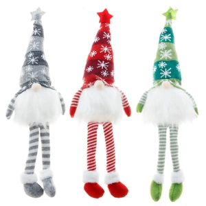 Three long-legged glowing Christmas gnomes in red, green, and grey with snowflake hats