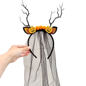 Halloween headband with black branches, smiling pumpkin, and sheer black mesh veil