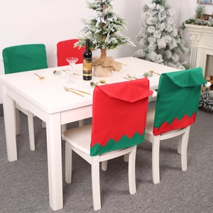 Christmas elf hat chair covers in red and green non-woven fabric for dining room decor