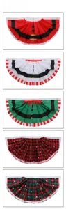 Detail of Christmas pleated bunting set with various festive patterns and metal eyelets