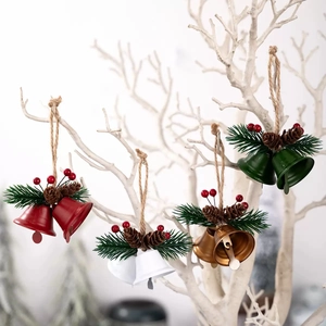 Christmas bell ornaments with pine cones and red berries in red, white, gold, and green