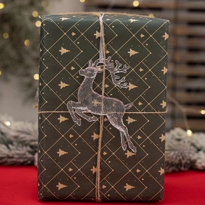 Creative Christmas translucent elk pendant hanging on a festive green gift box