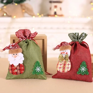 5-pack Christmas drawstring gift bags with Santa and Snowman 3D plush designs