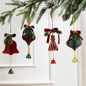 Set of four vintage honeycomb paper Christmas ornaments with pine cones and bells