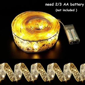 Golden Christmas LED ribbon string light with star patterns for holiday tree decoration
