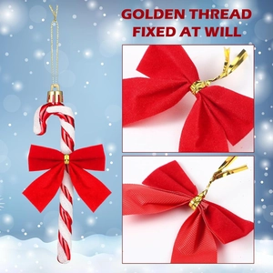 Christmas candy cane hanging ornament with red white stripes and festive golden thread tie