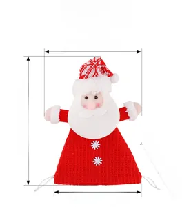 Detail view of Santa Claus knitted Christmas gift bag with size dimensions and 3D texture